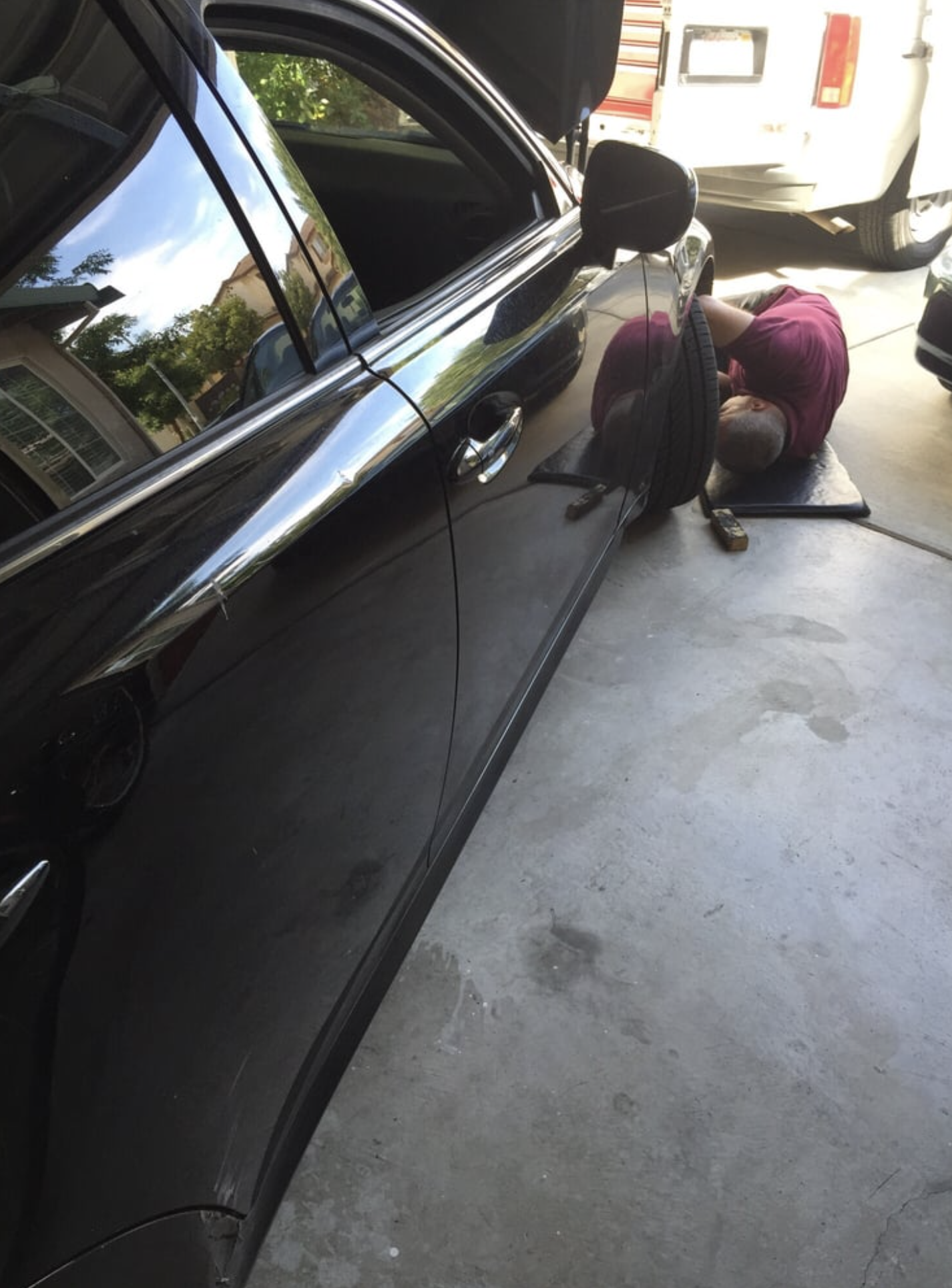 this image shows car mechanic in West Palm Beach, FL